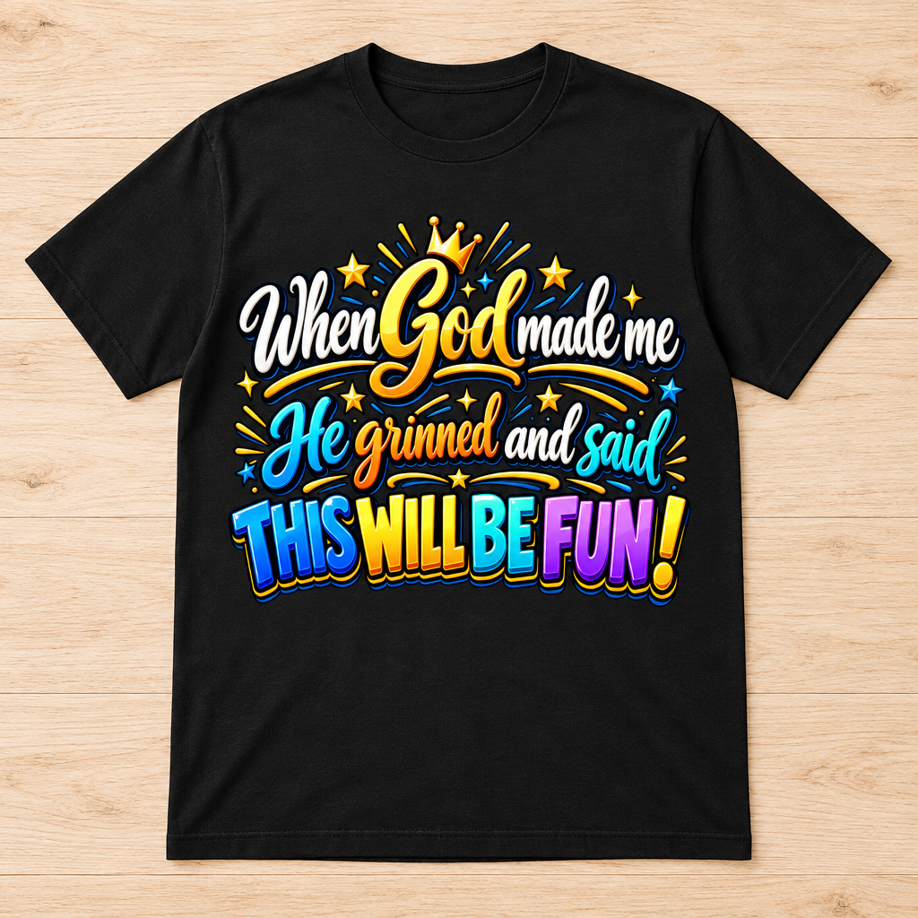 When God Made Me He Said This Will Be Fun DTF print t-shirt flat lay mockup on light wooden surface